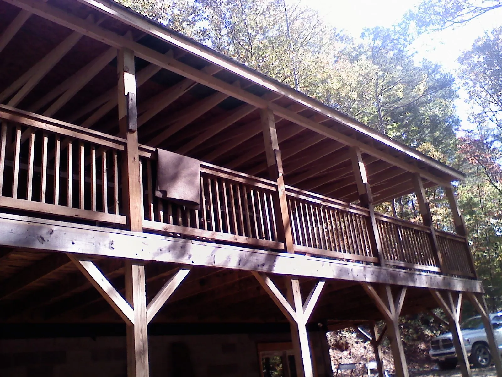 Timber framing under a new elevated porch and deck — Roof Leak Repair in Bomont by Roofing Brothers